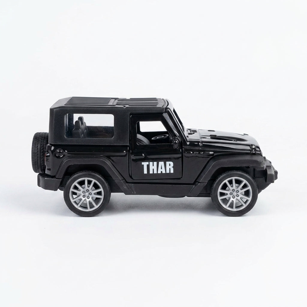 Black Thar car toy on a white background