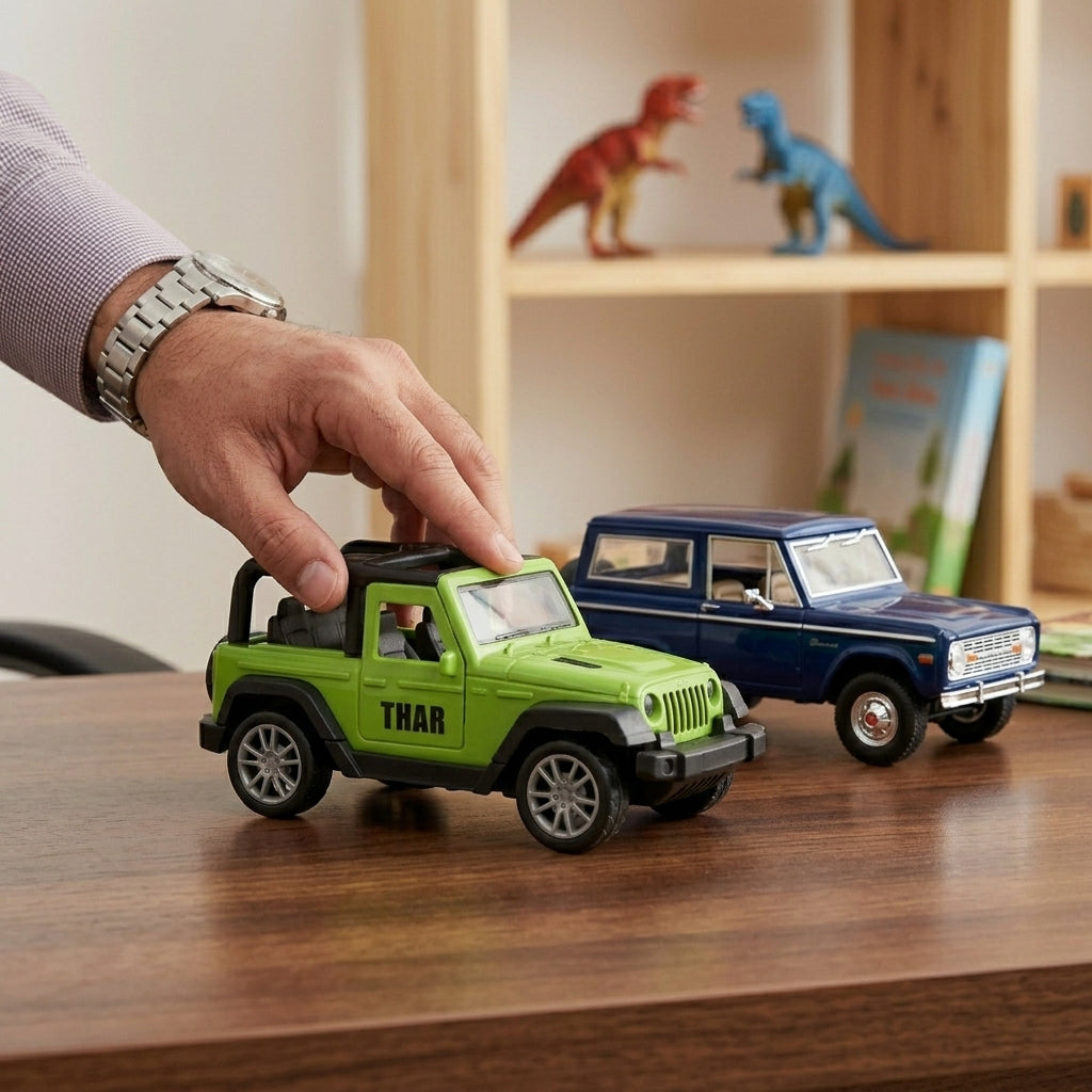 Hand interacting with toy cars on a wooden surface with dinosaur figurines in the background