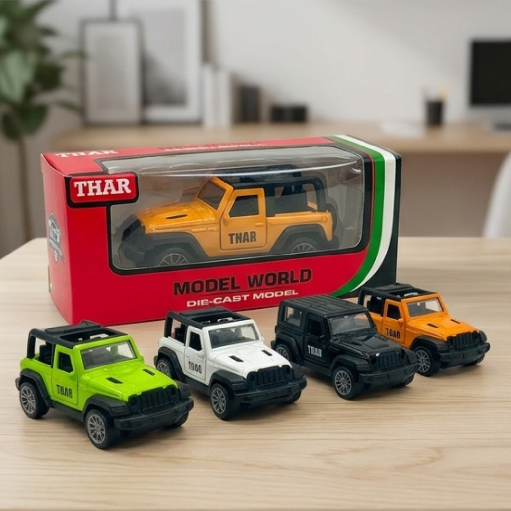 Four toy cars in front of their packaging on a wooden surface