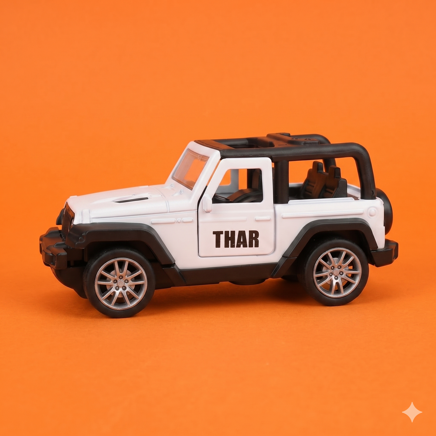 Model of a white and black SUV with 'THAR' branding on an orange background